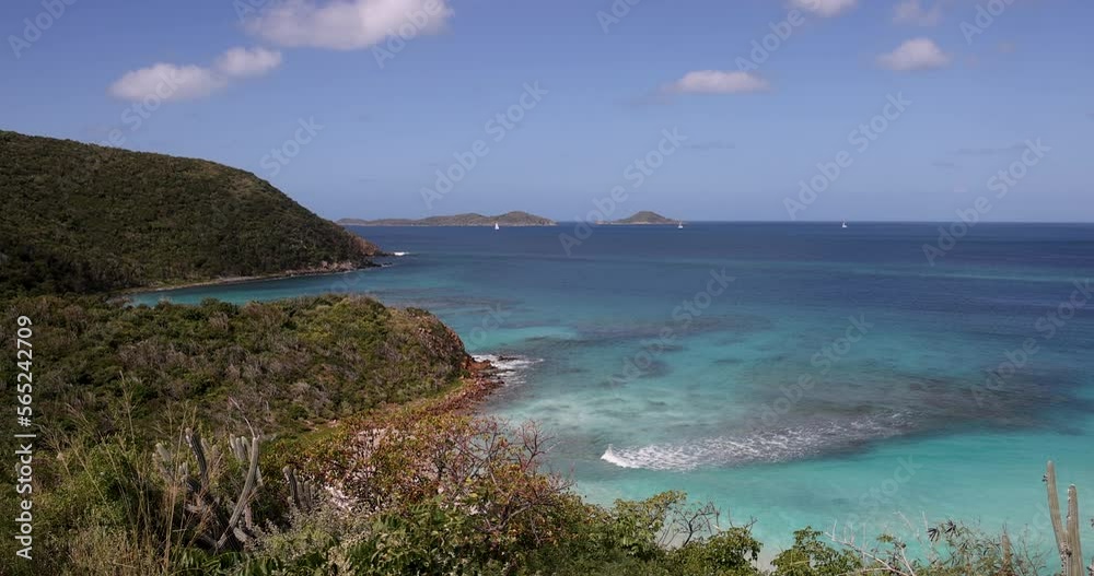 Virgin Gorda Caribbean ocean bay rocky beach sailboats. Commonwealth of the United Kingdom, British Virgin Islands. Cruise ship vacation destination. Resort, yacht, sailboat harbor and marina. Virgin Gorda Caribbean ocean bay rocky beach sailboats. Commonwealth of the United Kingdom, British Virgin Islands. Cruise ship vacation destination. Resort, yacht, sailboat harbor and marina.