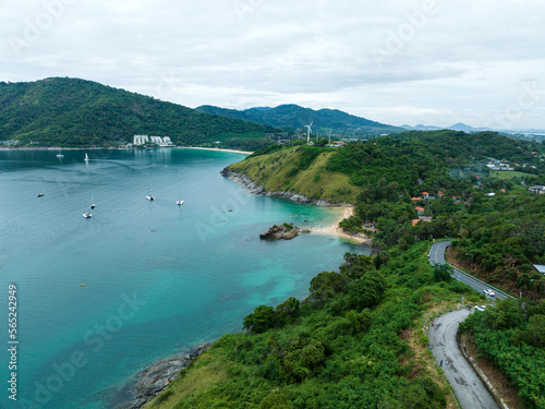 Aerial view of curve road along the seashore at Phuket Thailand beautiful seacoast and open sea in summer season Nature recovered Environment and Travel background