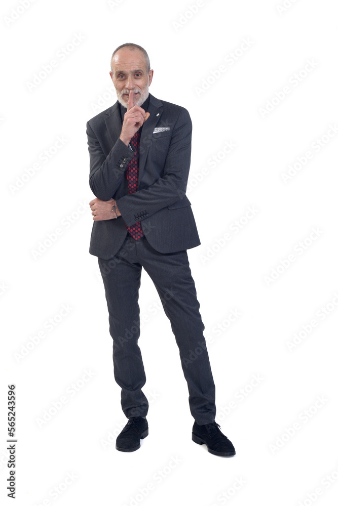 man showing silence with sign of his finger cover the mouth on white backgroound man showing silence with sign of his finger cover the mouth on white backgroound