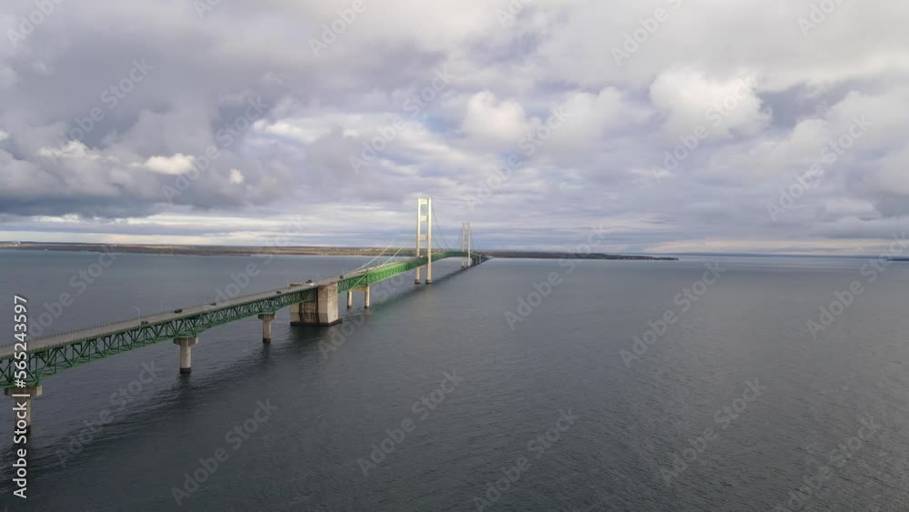 Sun shines on the Historic Mackinac Bridge over the straights of Mackinac, in Michigan USA - aka Sun shines on the Historic Mackinac Bridge over the straights of Mackinac, in Michigan USA - aka