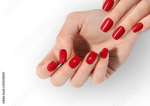 Murais de parede Close Up Of Female Hands With Trendy Red Nails On Purple Background