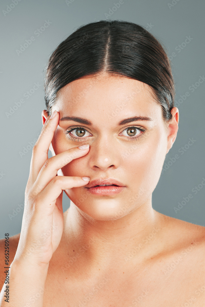 Woman, beauty and portrait in studio for skincare, wellness and facial cosmetics. Young female model touching face, aesthetic makeup and dermatology from healthy shine, natural glow and salon results Woman, beauty and portrait in studio for skincare, wellness and facial cosmetics. Young female model touching face, aesthetic makeup and dermatology from healthy shine, natural glow and salon results