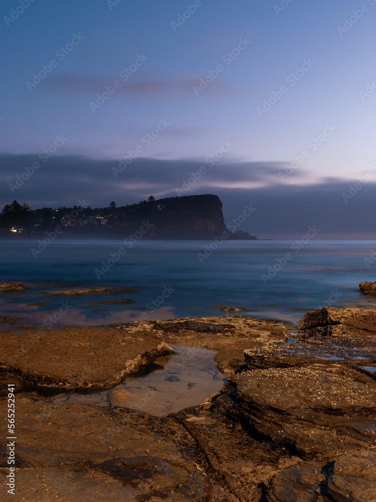 Rocky coastline at Avalon Beach at dawn time, Sydney, Australia.