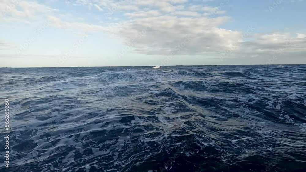 Caribbean blue ocean at sea level splash underwater slow. Destination vacation travel tropical ocean sea. Caribbean cruise ship wake boat. Beautiful blue Caribbean Ocean water. Vacation. Caribbean blue ocean at sea level splash underwater slow. Destination vacation travel tropical ocean sea. Caribbean cruise ship wake boat. Beautiful blue Caribbean Ocean water. Vacation.