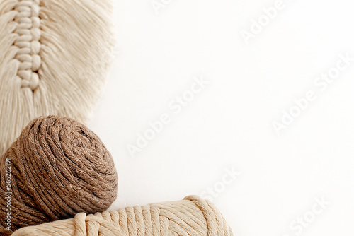 Macrame leaf. Cotton rope decor. handmade for home decoration. macrame braiding and cotton threads on white background.