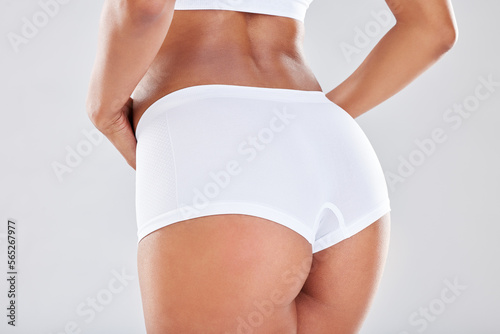 Photo Woman, ass and underwear with sexy waist in weight loss, diet or healthcare against a grey studio background