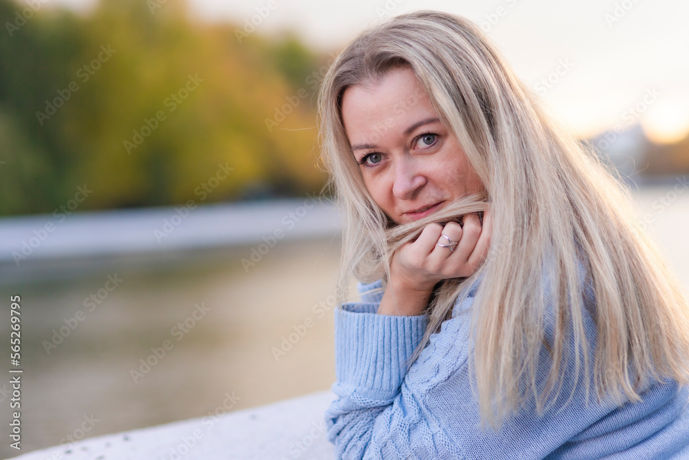 Seasonal and People Ideas. Winsome Caucasian Beautiful Young Woman Walking in Autumn Park Seasonal and People Ideas. Winsome Caucasian Beautiful Young Woman Walking in Autumn Park