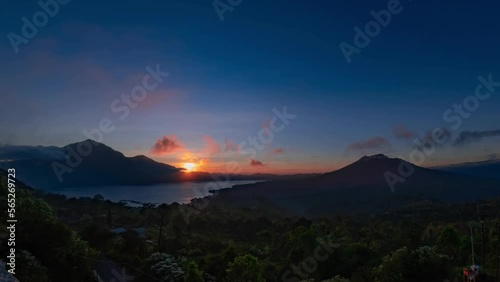 Wallpaper Mural Sunrise in mountains, timelapse. View on volcanoes with lake among them. Clouds are moving fast Torontodigital.ca