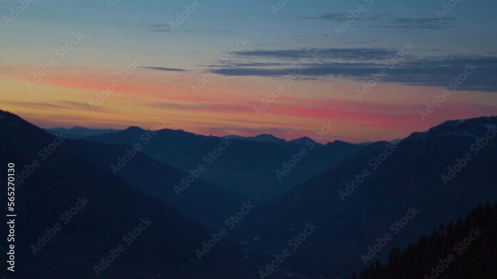 Silhouette shot of mountain layers of the Kullu Valley during the morning as seen from the top of the mountain peak at Manali in Himachal Pradesh, India. Himalayan mountain range during sunrise. Silhouette shot of mountain layers of the Kullu Valley during the morning as seen from the top of the mountain peak at Manali in Himachal Pradesh, India. Himalayan mountain range during sunrise.