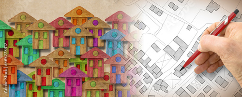 Global village made of wooden houses - concept image with an imaginary city map on background