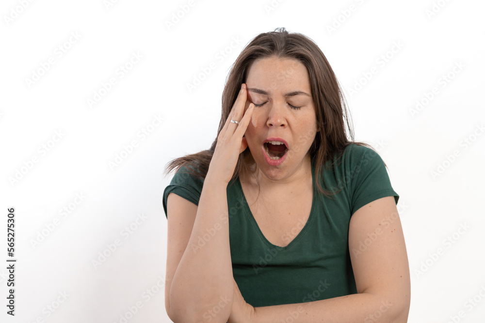 long-haired brunette woman yawning white background long-haired brunette woman yawning white background