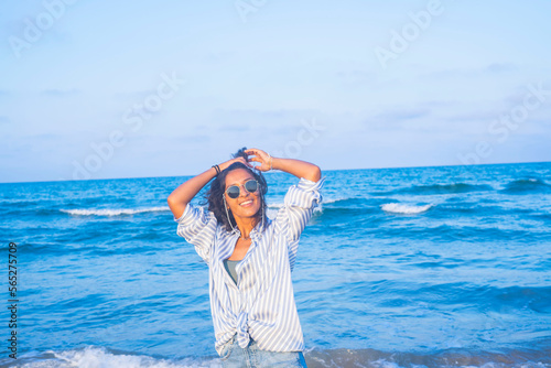 Young indian woman happy in the beach