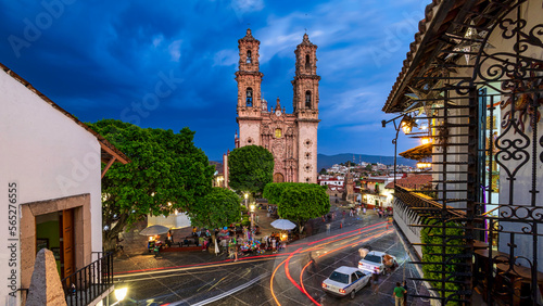 Taxco de Alarcon: Mexico's Silver Capital. An early evening view of Taxco’s Zocalo (city plaza) and its beautiful Templo de Santa Prisca.  photo