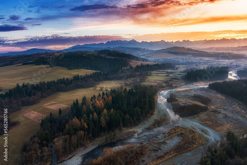 aerial view of the Białka Tatrzańska river gorge at sunset, with mountains in the background, High Tatras, Podhale