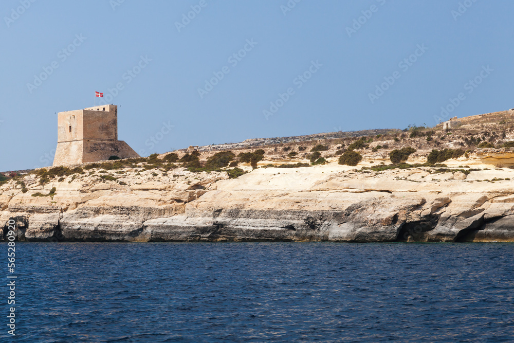 Gozo island coastal landscape with Mgarr ix-Xini Tower