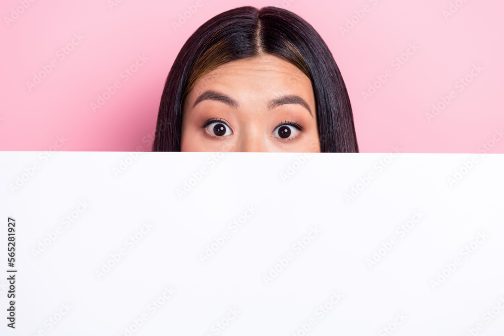 Photo of charming impressed lady wear green sweatshirt white placard empty space cover mouth isolated pink color background Photo of charming impressed lady wear green sweatshirt white placard empty space cover mouth isolated pink color background