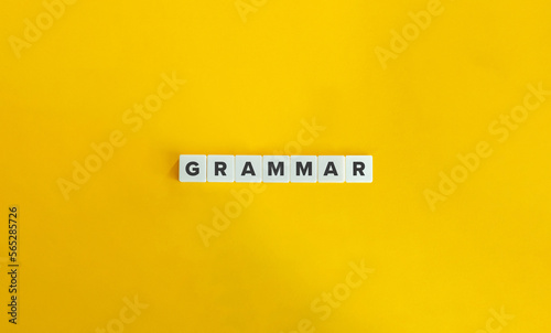 Grammar Word on Block Letter Tiles on Yellow Background. Minimal Aesthetics.