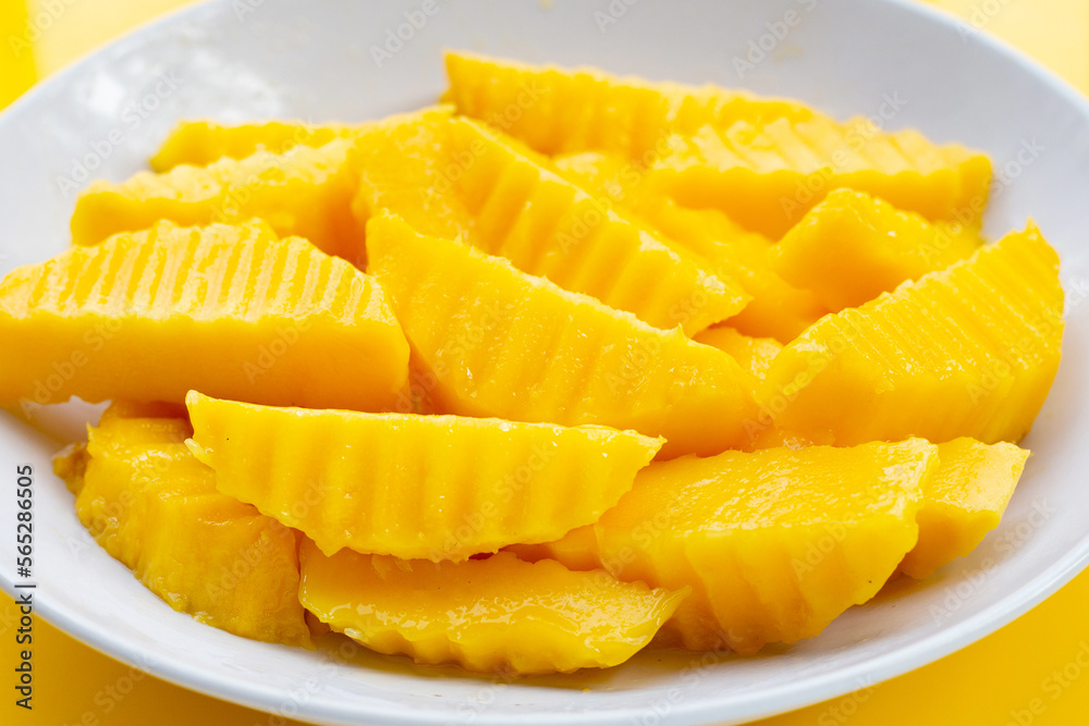 Sweet yellow mango fruit slices Sweet yellow mango fruit slices