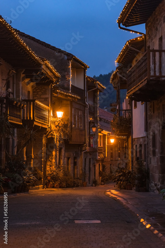 Beautiful village of Cartes illuminated at night  in Cantabria  Spain.