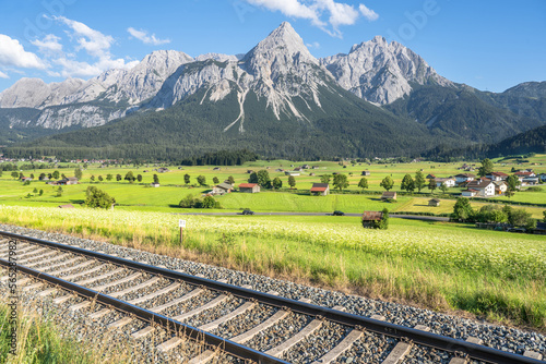 Fototapeta Naklejka Na Ścianę i Meble -  Railway with Mountain Zugspitze in the background, Ehrwald, Germany