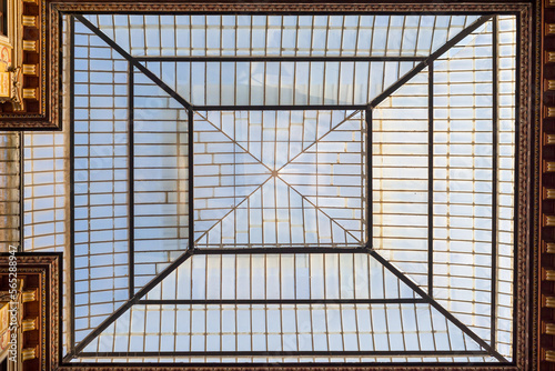 Obraz na płótnie The glass roof of the building in Rome seen from the inside. Architecture, building, facades. w salonie