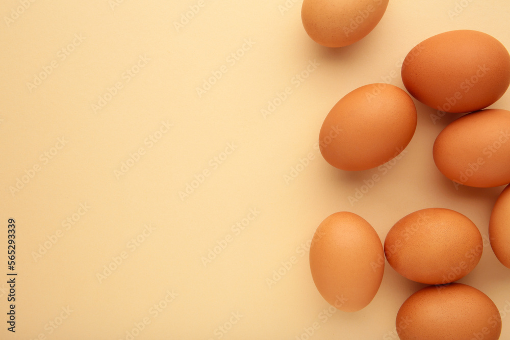 Chicken eggs on beige background. Farm products, natural eggs. Chicken eggs on beige background. Farm products, natural eggs.