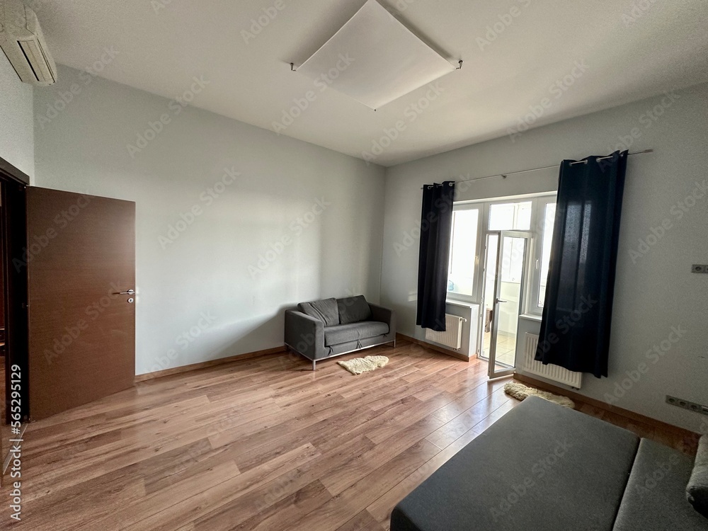 Fototapeta premium modern living room with small grey sofa