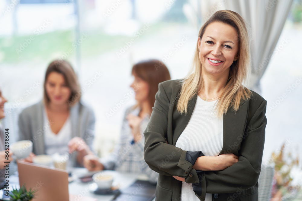 Portrait of mature young business woman in restaurant Portrait of mature young business woman in restaurant