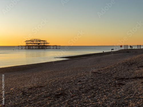 The sunsetting over the English Channel viewed from Brighton Beach, UK