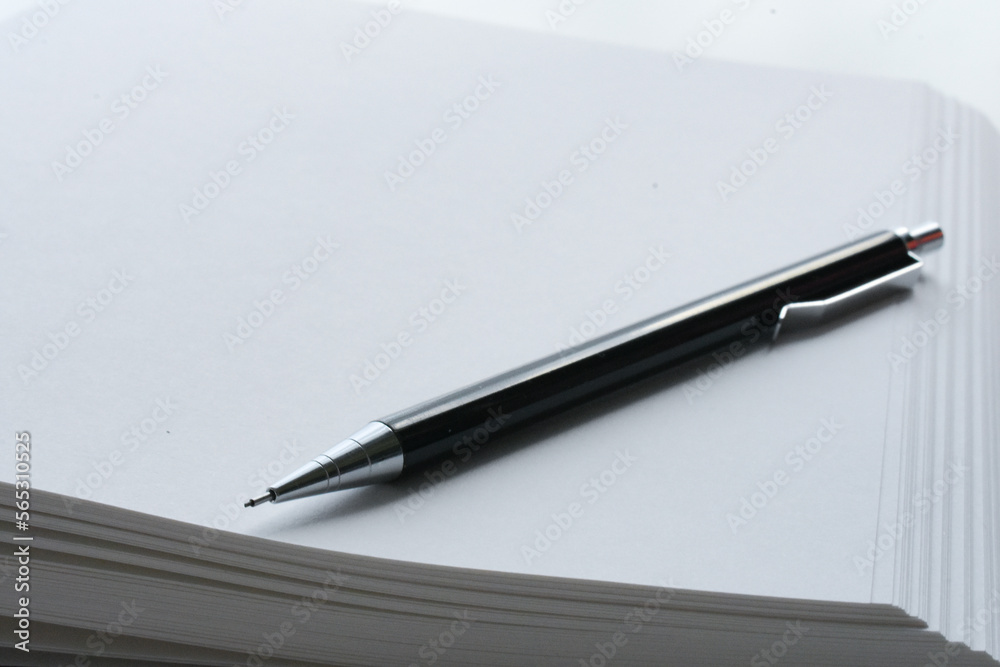 pen on notebook pen on notebook