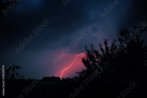 Thunderstorm and lightning in the open sea. Stormy sky with flashes of lightning. Nature during a hurricane.Night photo of a thunderstorm with a long exposure, close-up. Copy space.