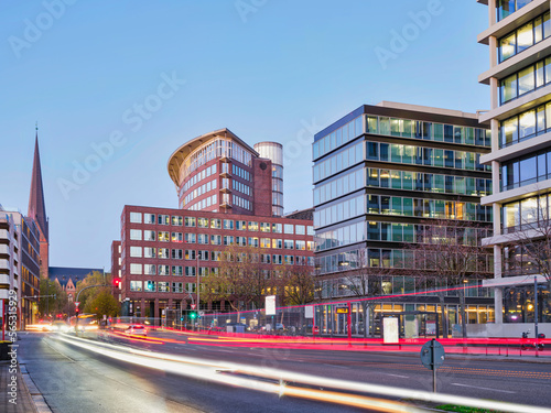 Hamburg city buildings and traffic light trails at dusk, Germany © Arnold
