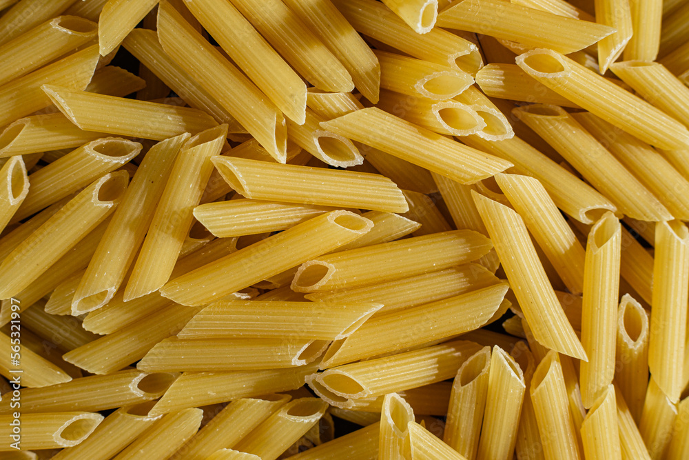 Raw pasta close-up. Pasta background Raw pasta close-up. Pasta background