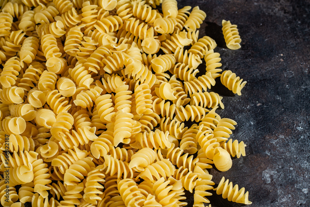 Raw pasta close-up. Pasta background Raw pasta close-up. Pasta background