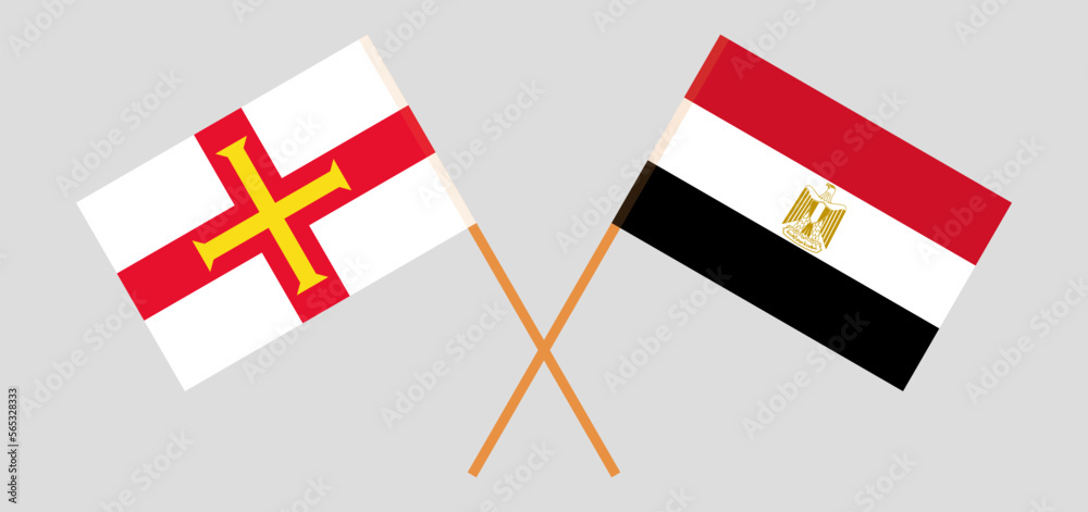 Crossed flags of Bailiwick of Guernsey and Egypt. Official colors. Correct proportion