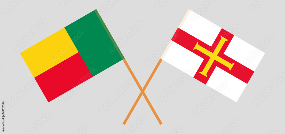 Crossed flags of Benin and Bailiwick of Guernsey. Official colors. Correct proportion
