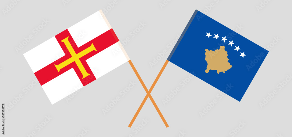 Crossed flags of Bailiwick of Guernsey and Kosovo. Official colors. Correct proportion