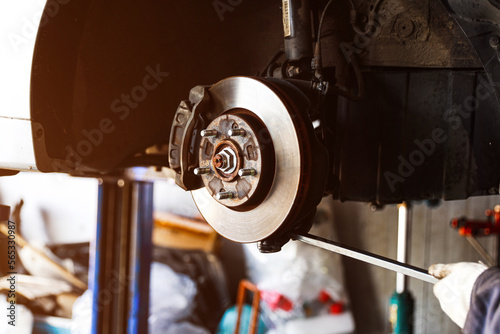 Automotive engineer replace brake disc