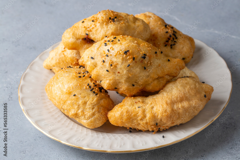 Turkish cuisine; Handmade Cheese spinach Pastry (Turkish name; peynirli - ispanakli pogaca, pisi)