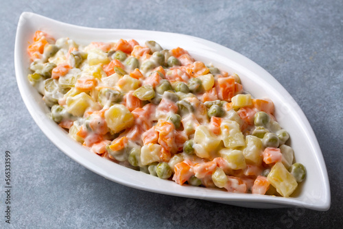 Russian salad Olivier with mayonnaise and egg served (Turkish name; Rus salatasi)