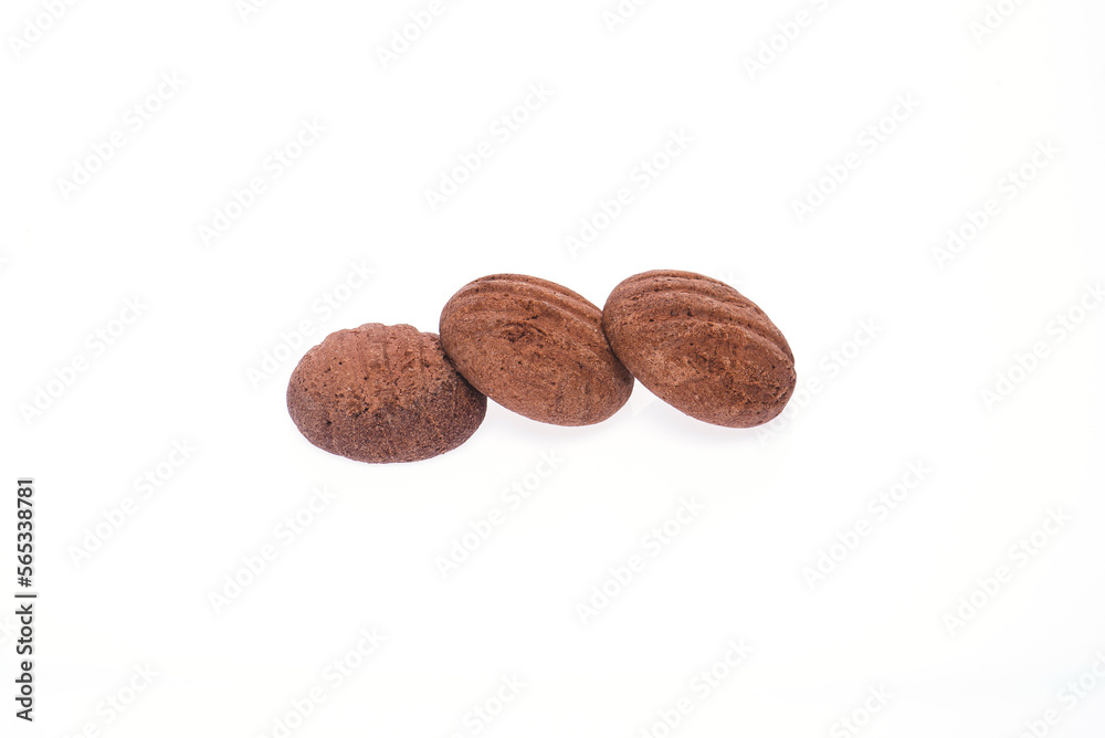 Three cookies partially covered with icing on a clean white isolated background. Three cookies partially covered with icing on a clean white isolated background.