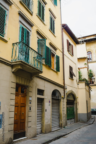 Historic street, a square in Italy with beautiful buildings and bicycles in parking lots
