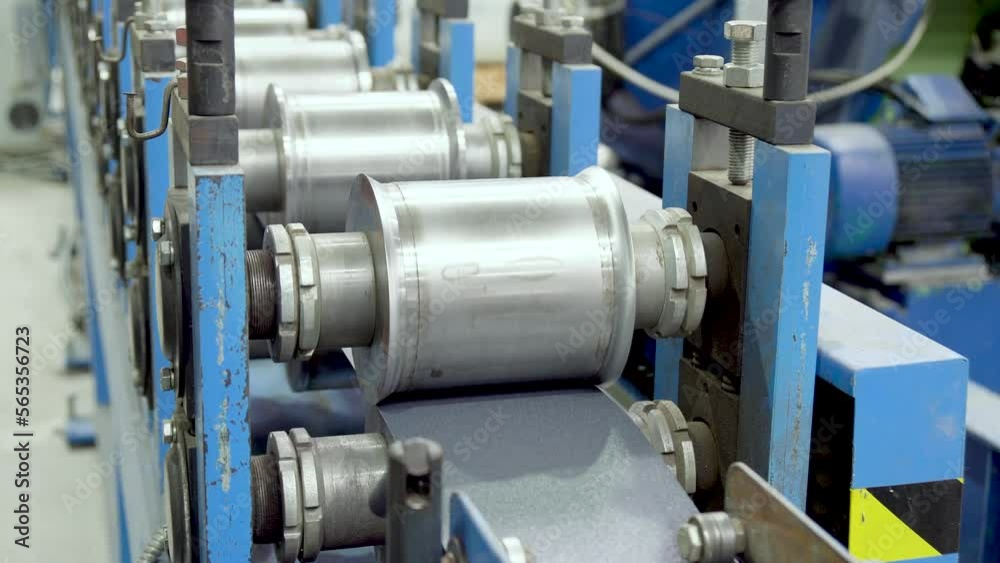 Production Line Of Metal Tile For Roof. Steel Forming Machine In Metalwork. Production Line Of Metal Tile For Roof. Steel Forming Machine In Metalwork.