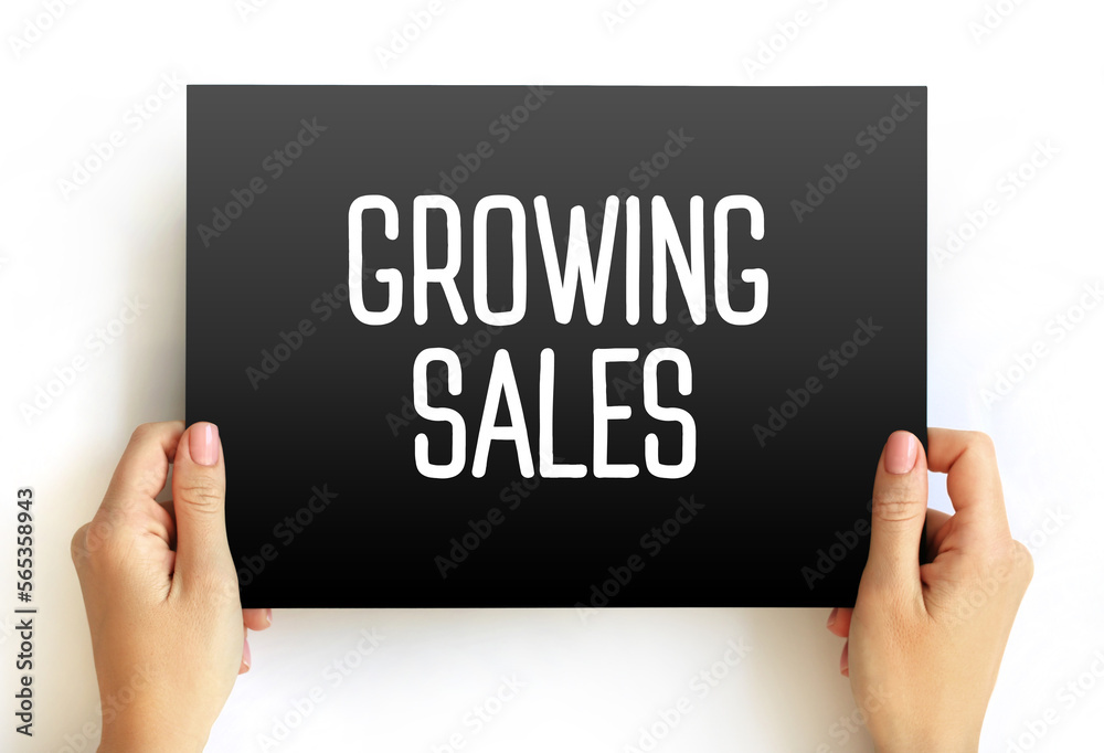 Growing Sales text on card, business concept background Growing Sales text on card, business concept background
