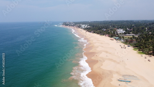 Sri Lanka Southern beaches captured by a drone. Indian blue ocean with clear blue sky  warm tropical temperature  