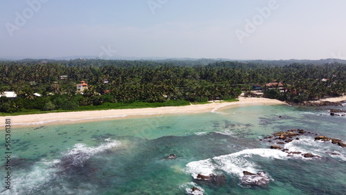 Sri Lanka Southern beaches captured by a drone. Indian blue ocean with clear blue sky, warm tropical temperature, 