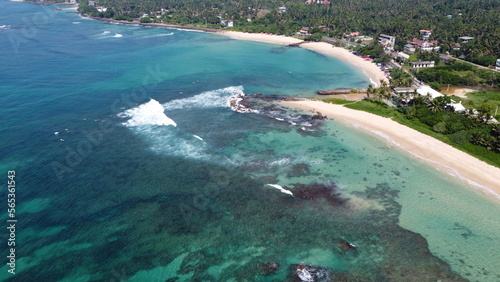 Sri Lanka Southern beaches captured by a drone. Indian blue ocean with clear blue sky, warm tropical temperature, 