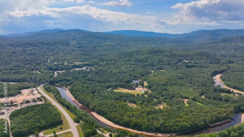 Aerial view of Campton Mountain, Pemigewasset River and Interstate Highway I-93 in summer with White Mountain National Forest at the background in town of Campton, New Hampshire NH, USA.  photo