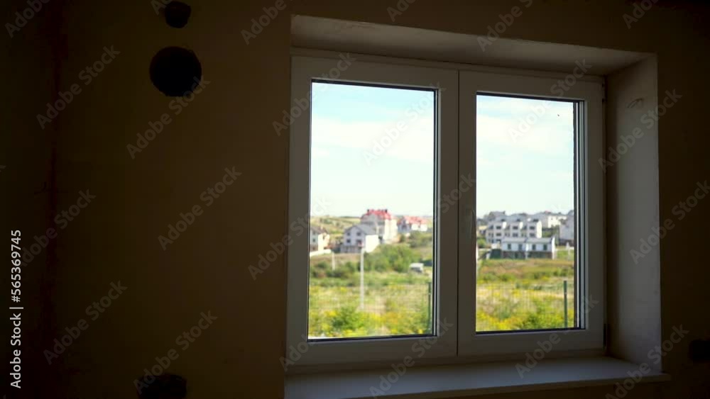 Interior Of The Unfinished Building. The walls are covered with plasterboard. Wooden beams. Slow motion Interior Of The Unfinished Building. The walls are covered with plasterboard. Wooden beams. Slow motion