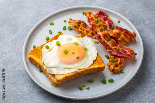 Fried eggs with bacon. Baco...